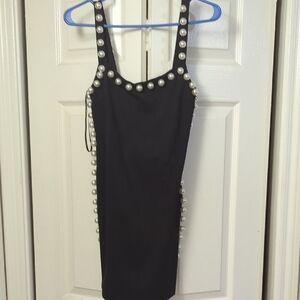 Elegant Black Dress with Pearl Accents